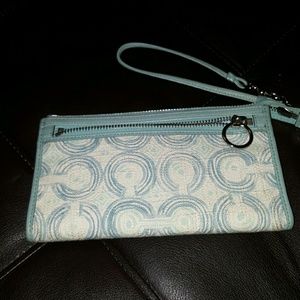 Teal and off white Coach clutch