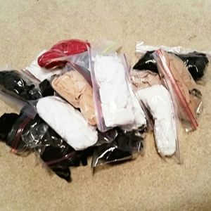 13 pairs of thigh highs and 3 pairs of pantyhose