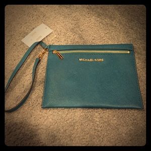 Authentic Michael Kors wristlet in teal