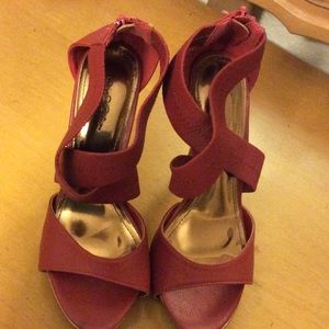 Red and gold high heel shoes