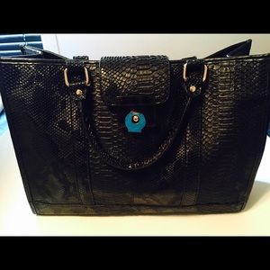 Black soft leather handbag
