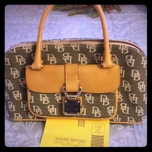 RARE Dooney & Bourke small domed pocket book