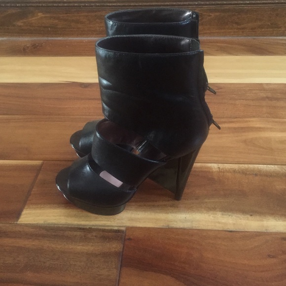 Genuine leather sexy heals by Paris Hilton.