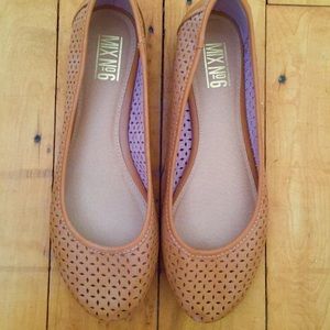 Brown eyelet flats