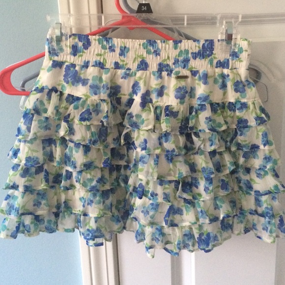 white ruffle skirt with blue flowers