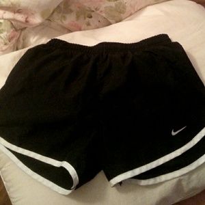 Black Nike running shorts