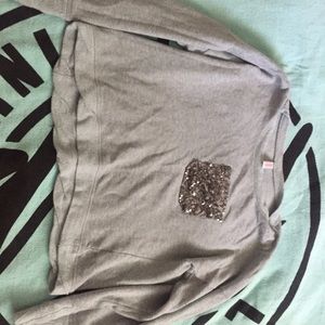 Crop sweater with sequin pocket