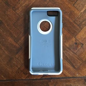 Grey and white OtterBox iPhone 6 case.