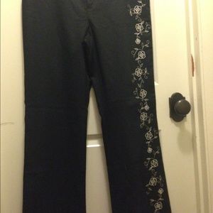 Black slacks with embroidered leg. Never worn