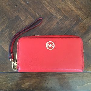 Micheal Kors wallet.
