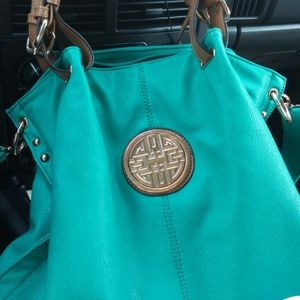 Teal green handbag