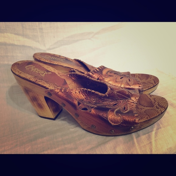 Carlos Santana clogs.