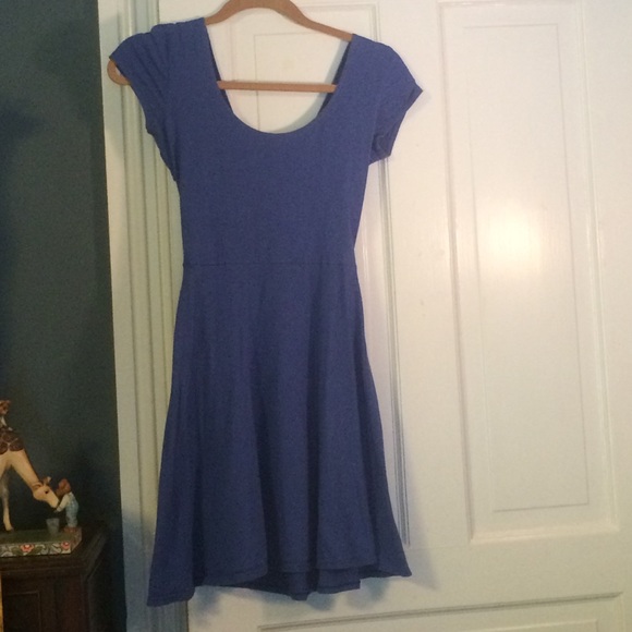 Short blue dress with cut out back.