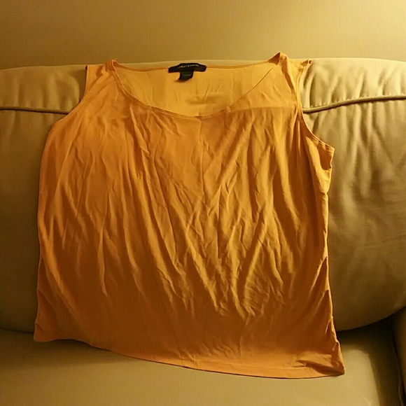 Gold tank top.