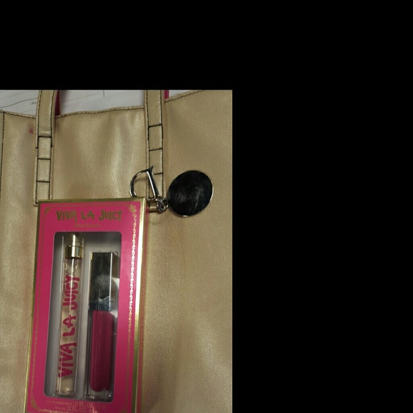 SOLD viva LA juicy roll on perfume lip gloss