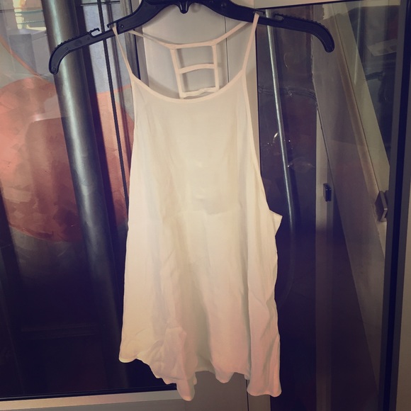 Flow/loose white tank with cut outs!