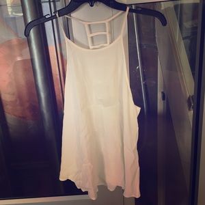 Flow/loose white tank with cut outs!