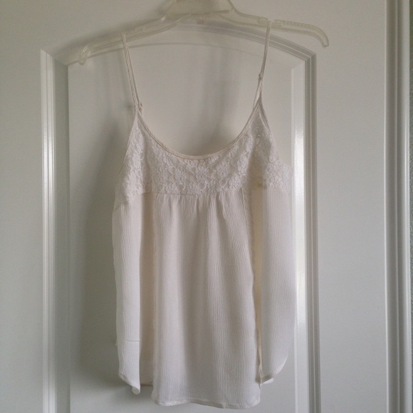 Cream colored spaghetti strap tank w/ lace accents