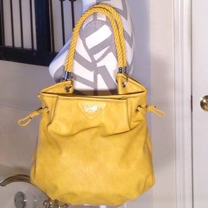Yellow/ mustard colored bag by Jessica Simpson