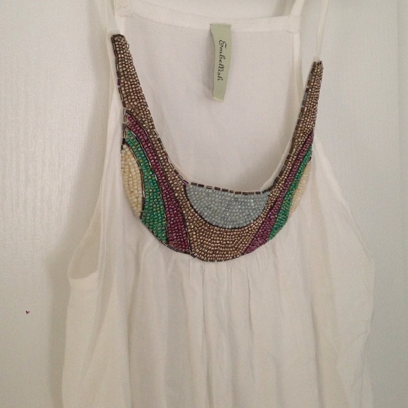 White flowy top with detailed neck