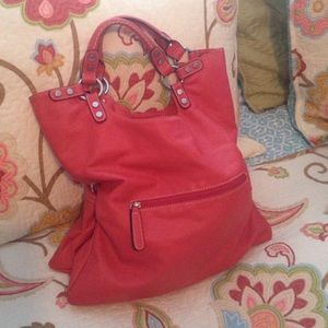 Peach colored handbag