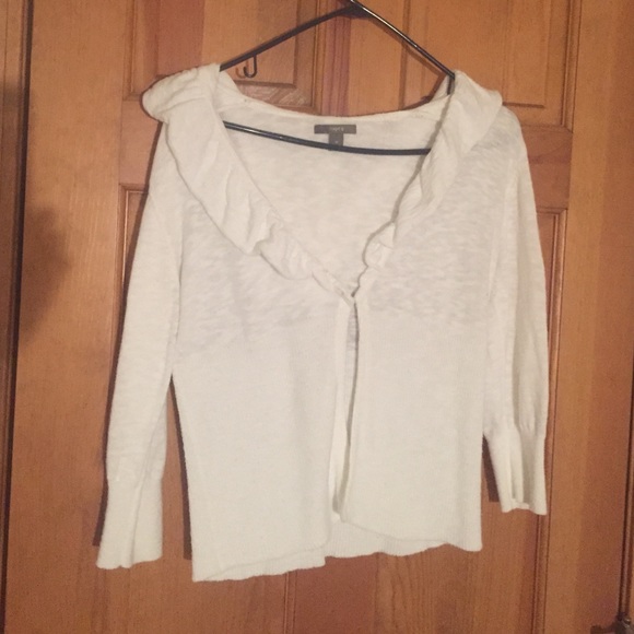White ruffled button up sweater with hood