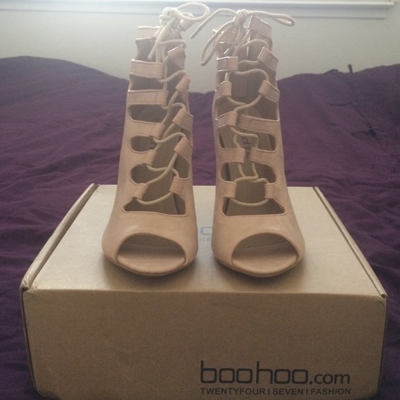 Nude criss cross strapped lace heels