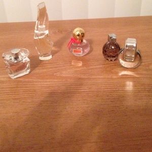 5 designer perfumes. Never been used