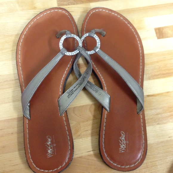 Gray and brown flip flops