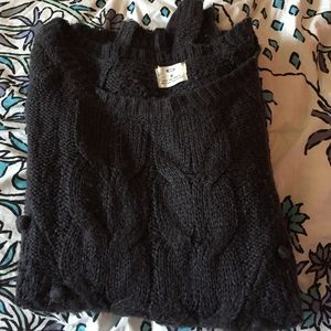 Dark colored sweater