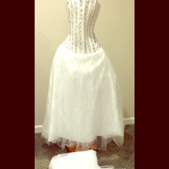 Gorgeous heavily beaded strapless Wedding dress