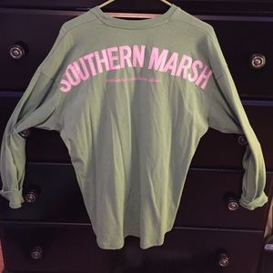 Southern marsh long sleeve/spirit tee type top.