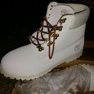 black timberland boots with gold chain laces