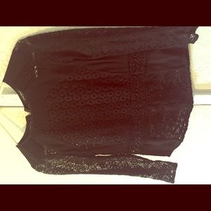 Tailored black lace top.