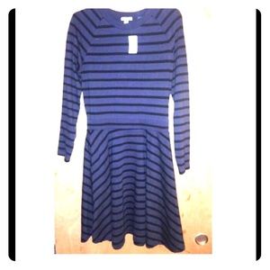 grey and black striped, long sleeved skater dress.