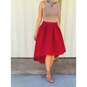 Burgundy midi skirt and black puff skirt
