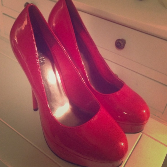 Patent red pumps