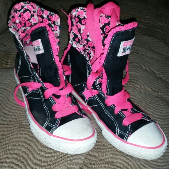 Pink and black converse