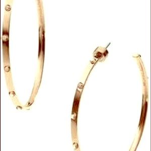 Michael Kors Gold Hoops
.