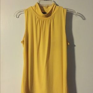 Sleeveless silk mock turtle neck