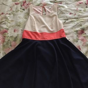 Cream, coral, and navy dress