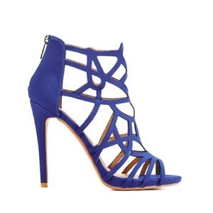 Stiletto heel, new NEVER worn, color is COBALT.