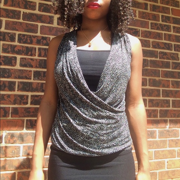 White spotted black top