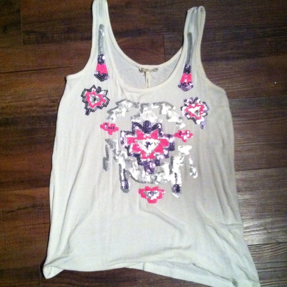 Cream tank-tribal embellishments