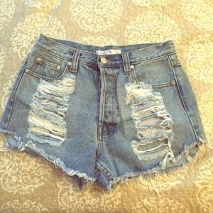 Mink pink distressed denim shorts