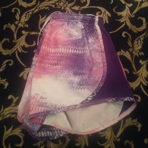 pink/purple pattern Nike dri-fit running shorts