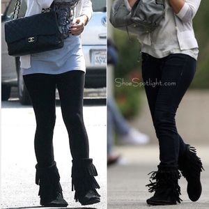 Black Minnetonka fringe boots size 8 FITS LIKE a 7