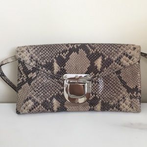 Michael Kors clutch purse with det. strap