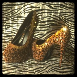 Tiger print heels b the roar of d party wit dazzle
