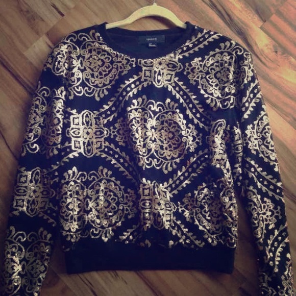 Black and gold sweater